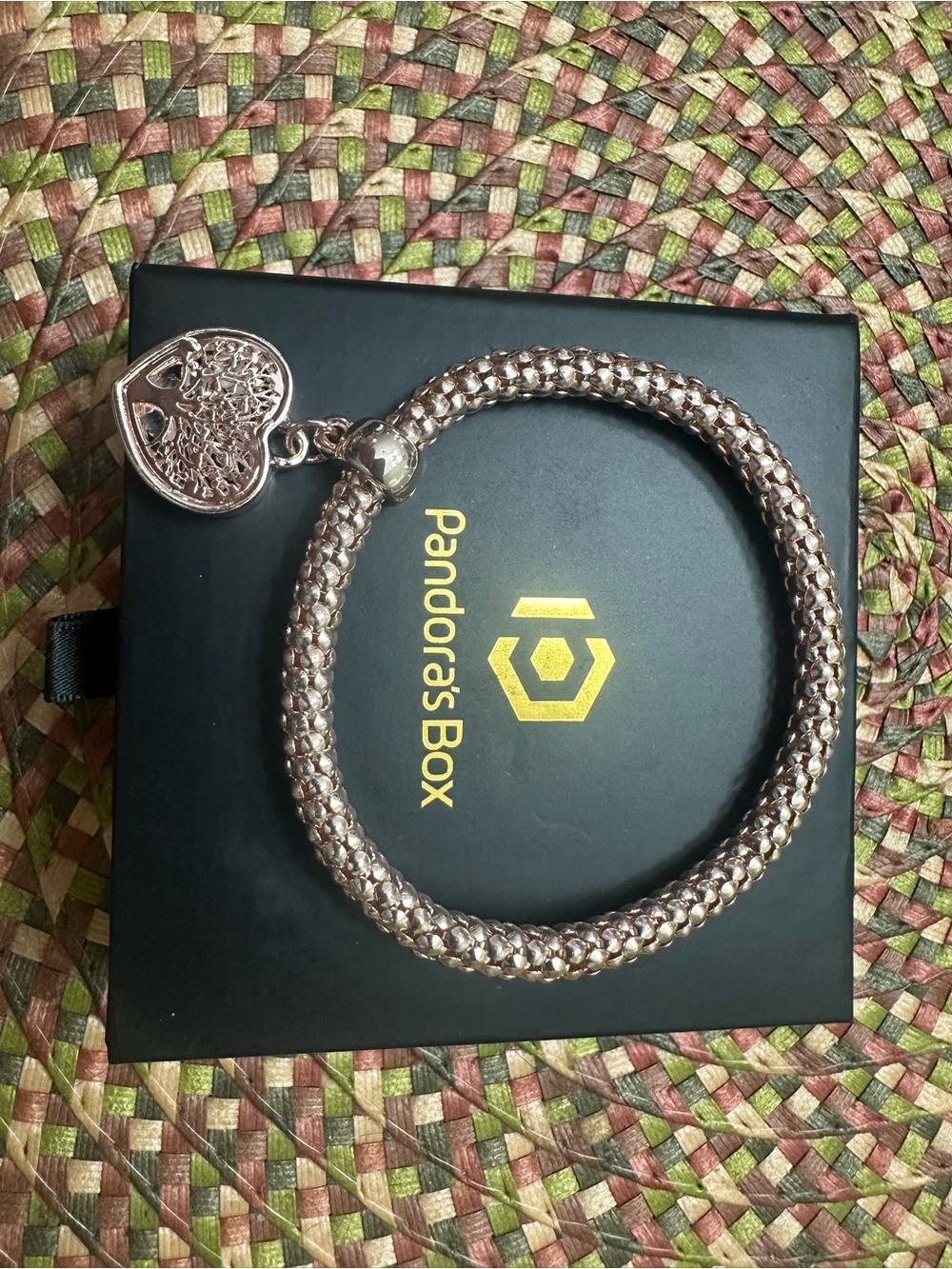 Pandora’s Box  Rose-Tone Braided Bracelet with Filigree Heart Charm